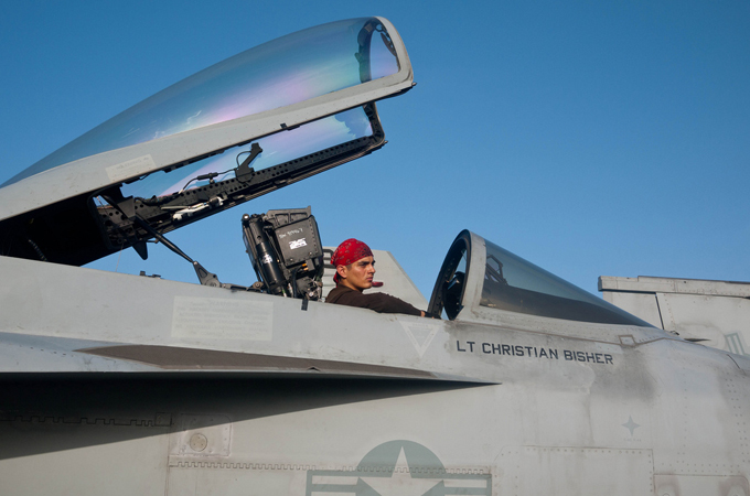 Mechanic on a jet fighter on the US 5th fleet in the Persian Gulf - for FAULT LINES