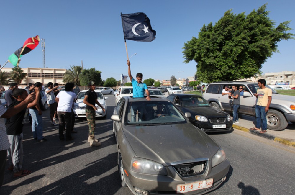 The black Cyrenaica flag is used by federalist protesters aiming to create an eastern region independent from Tripoli.