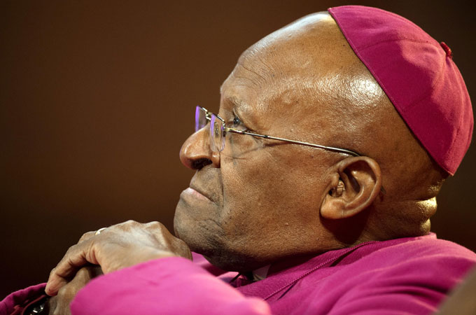 Tutu says it is tragic to see Western politicians who opposed military intervention get slammed for being cowardly [Reuters]