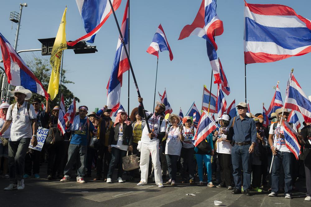 <p>Anti-government protesters gather at the Democracy Monument in Bangkok, before embarking on a march through the city centre - the first salvo in a planned 20-day "shutdown" of the Thai capital, starting Monday.</p>