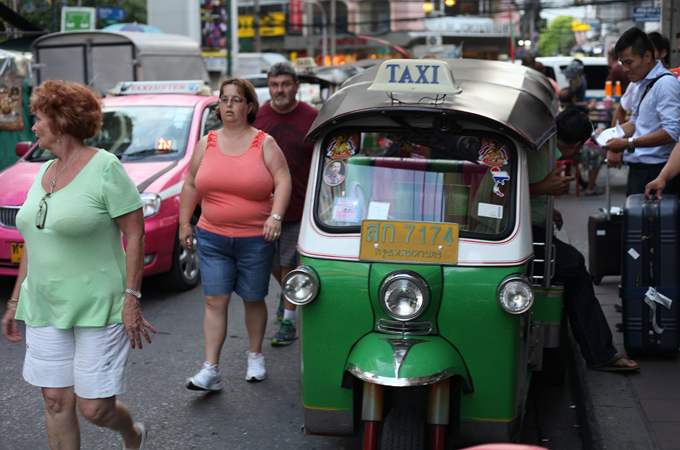 A warning issued to foreigners who have overstayed by more than 90 days states they would be banned from Thailand for between one and ten years [Steve Finch/Al Jazeera]