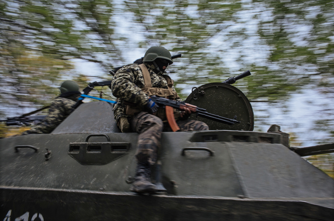 A Ukrainian soldier on an armored military vehicle in Kramatorsk town, near Slaviansk, Ukraine [EPA]