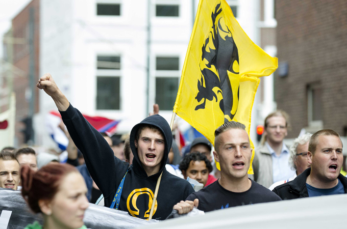 Protesters march against Muslim radicals, Islamic State and anti-Semitism in The Hague in August [EPA]