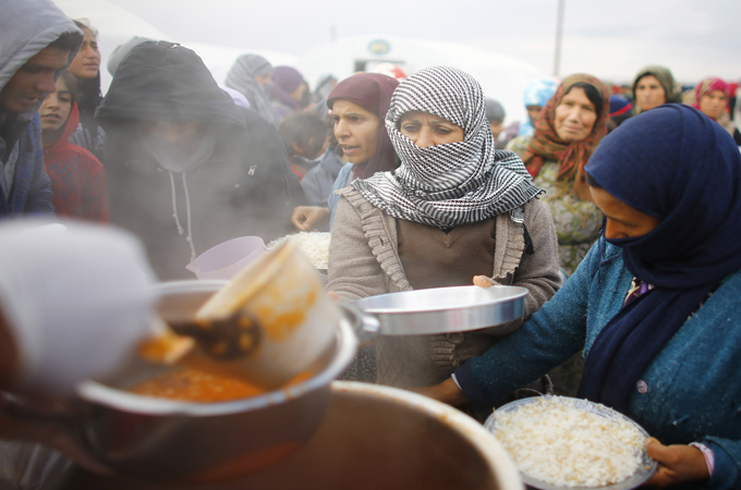 Crises in Syria and Iraq contribute to regional destabilisation leading to 'extreme risk' of rights violations [Reuters]