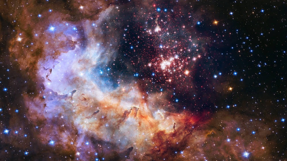 The telescope captured this image of a giant cluster of about 3,000 stars, which resides 20,000 light-years away from Earth [NASA via EPA]