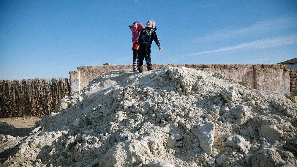 The high levels of toxic chemicals in water and salt-sands of the Aral Sea region pose a particular threat for child development [Timur Karpov/Al Jazeera] 