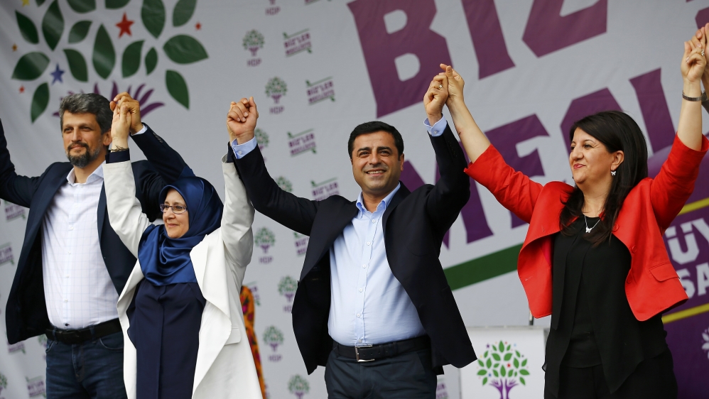 Selahattin Demirtas, co-chairman of the Pro-Kurdish Peoples'' Democratic Party (HDP), cheers with his party''s members during a gathering to celebrate the party''s victory in Istanbul [REUTERS]