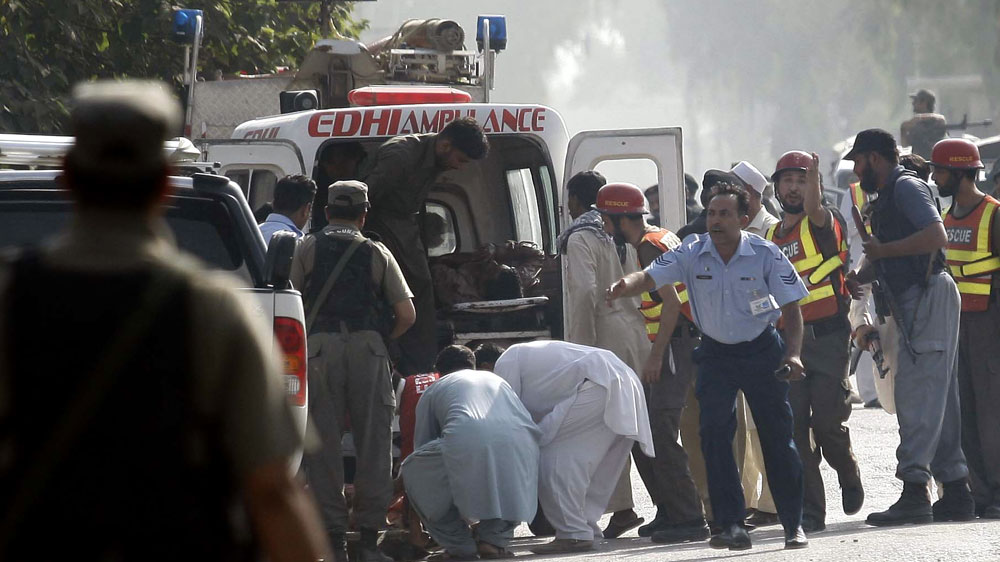 The Pakistani Taliban said it gave safe exit to women and children after attacking the airbase outside Peshawar [EPA]