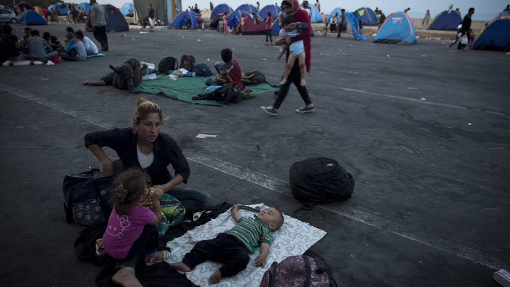 A Syrian child sleep at the port of the island of Lesbos