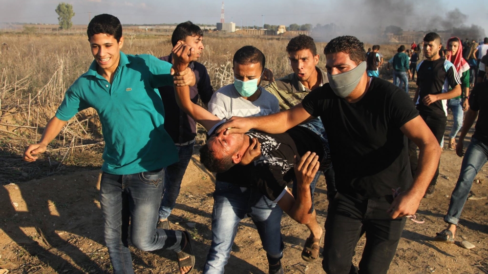 
Demonstrations are being led by young Palestinians who are growing increasingly anxious over lethal force being used as collective punishment [Ezz Zanoun/Al Jazeera]

