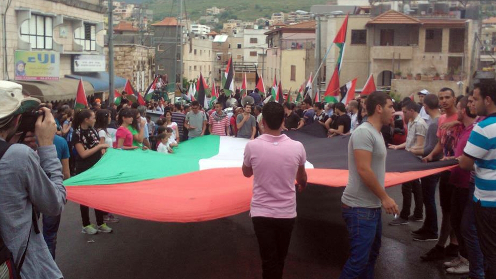 Palestinians mark killings in Israel