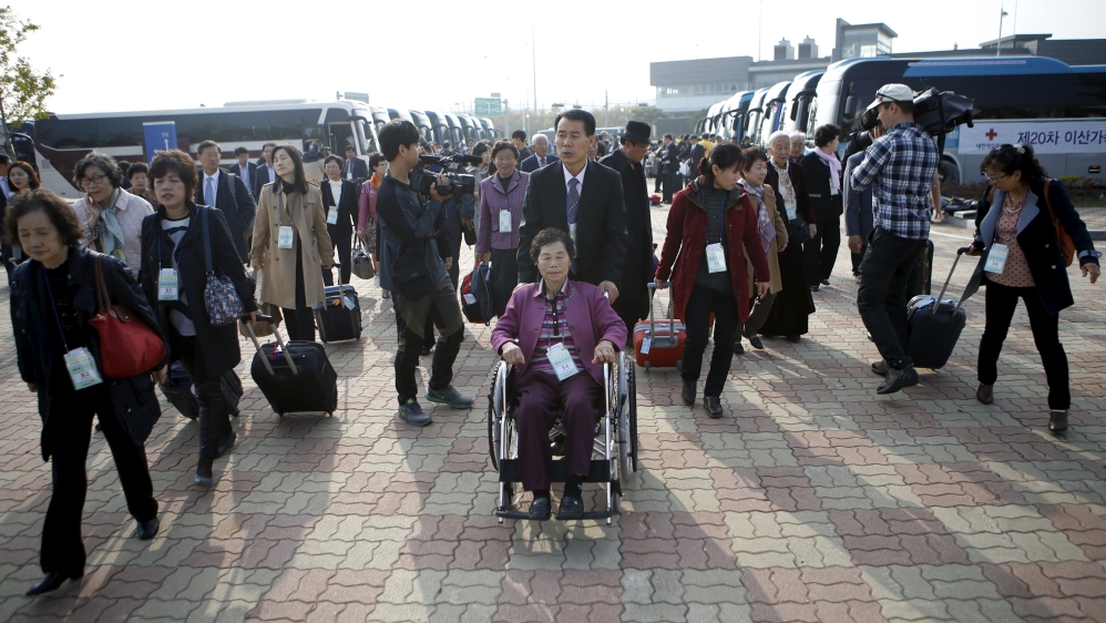 South Korean participants for a reunion arrive at the South''s CIQ, just south of the DMZ in Goseong