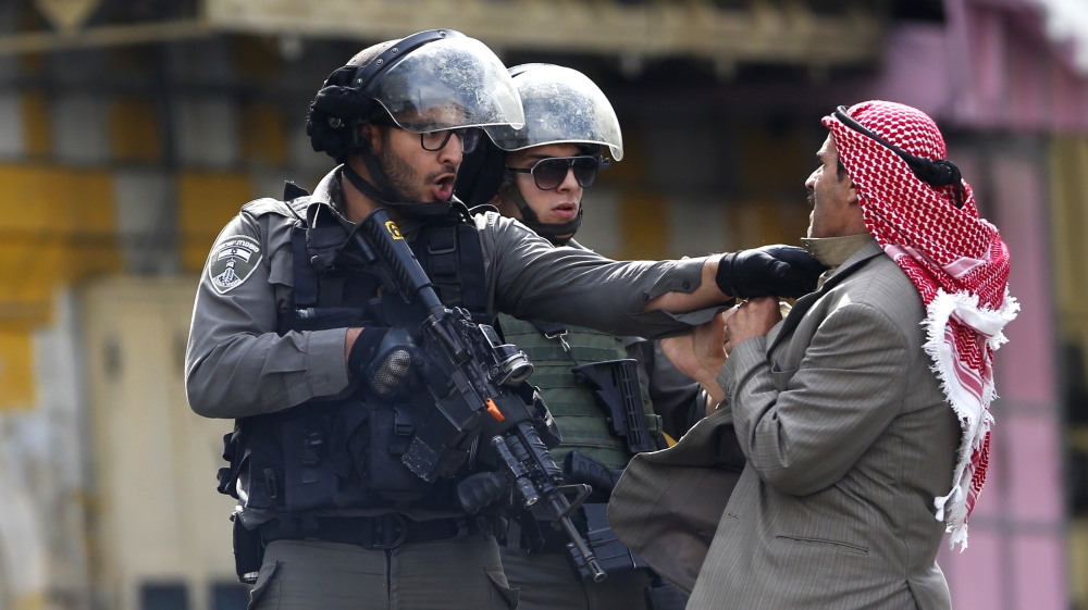 Concerns about aggressive policing have been underscored by a government decision to relax live-fire regulations in Israel and Jerusalem against demonstrators [AP]