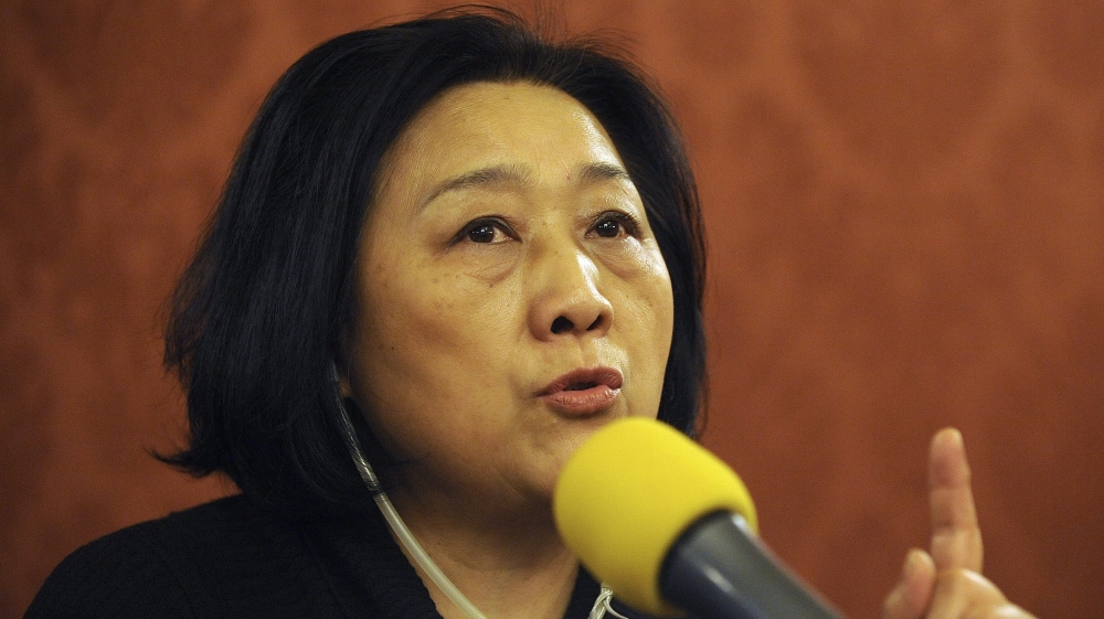 China reduces journalist''s sentence to five years from seven years after appeal