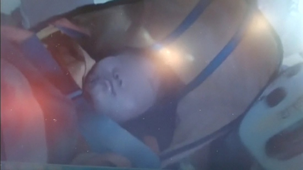 Still image taken from CCTV video footage shows an eight-year-old girl being pulled out of the wreckage of the 17-storey building which collapsed after an earthquake hit Tainan, in southern Taiwan
