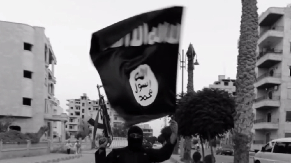 A member loyal to the Islamic State in Iraq and the Levant (ISIL) in Raqqa