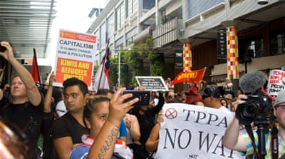  The deal involving 12 economies worth about $28 trillion was signed in New Zealand's Auckland on Thursday [Caitlin McGee]