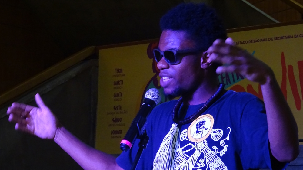 Pilar's son performing at Sarau do Binho [Kathleen McCaul/Al Jazeera]