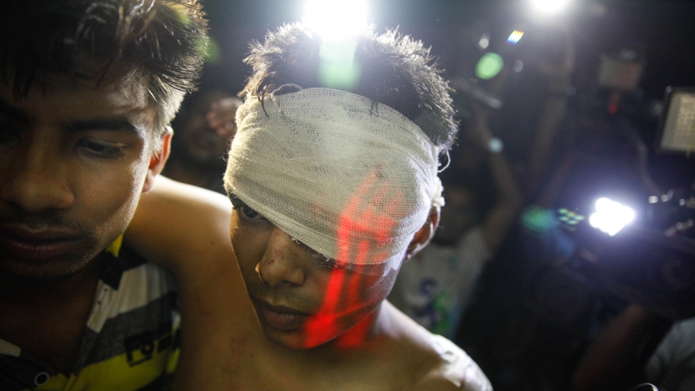 
Mollah, a security guard, was wounded in the attack and is being treated in hospital [Mahmud Hossain Opu/Al Jazeera]
