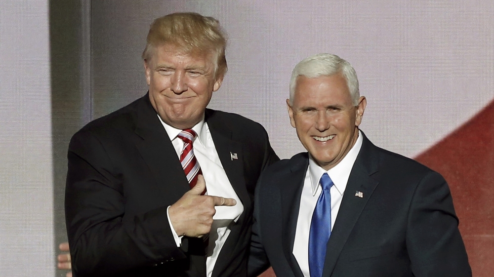 Republican U.S. presidential nominee Donald Trump greets vice presidential nominee Mike Pence after Pence spoke at the Republican National Convention in Cleveland