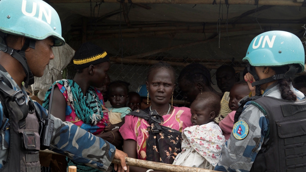 UN peacekeepers control South Sudanese wom