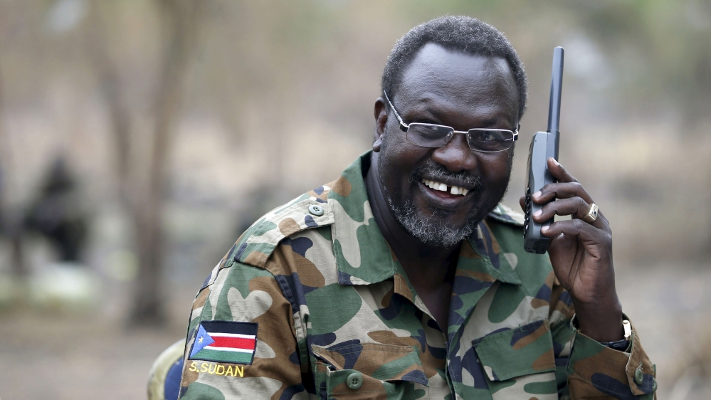 File photo of South Sudan''s rebel leader Riek Machar talking on the phone in his field office in a rebel controlled territory in Jonglei State