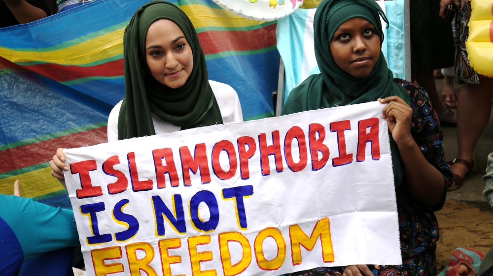 Protesters demonstrate against France's ban of the burkini, outside the French Embassy in London [Neil Hall/Reuters]