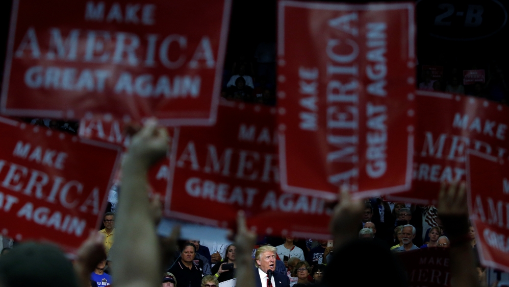 Republican presidential nominee Donald Trump is framed by 