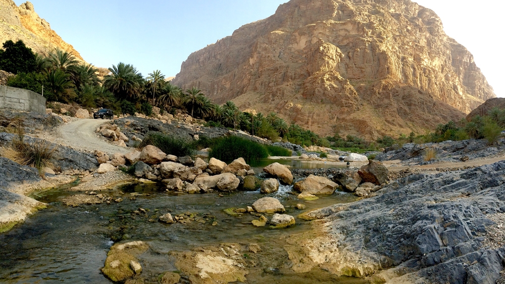 Deep pools, canyons and palm plantations characterise Wadi Al Arbaeen in the Muscat governorate [Baba Umar/Al Jazeera]