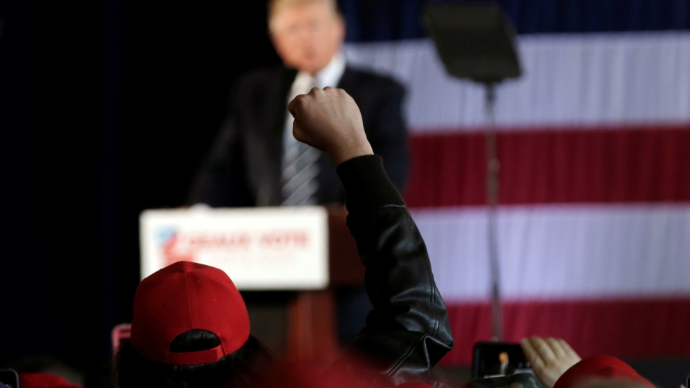 A supporter of U.S. President-elect Trump gestures during a "Thank You USA" tour rally in Baton Rouge