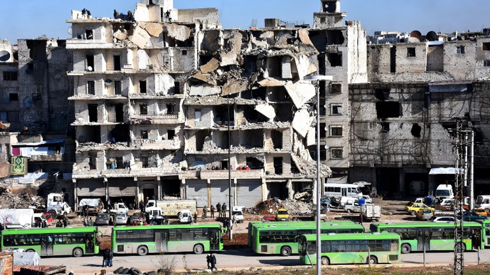 
Despite the evacuation, the UN warned that almost 50,000 remained in the area [AFP]

The evacuation was part of a ceasefire expected to last three days [Malek al-Shimale]
A total of 40 buses and ambulances carried out the two evacuations [AFP]
The head of the ICRC in Syria, Marianne Gasser, said it could take days to complete the evacuation [AFP]
