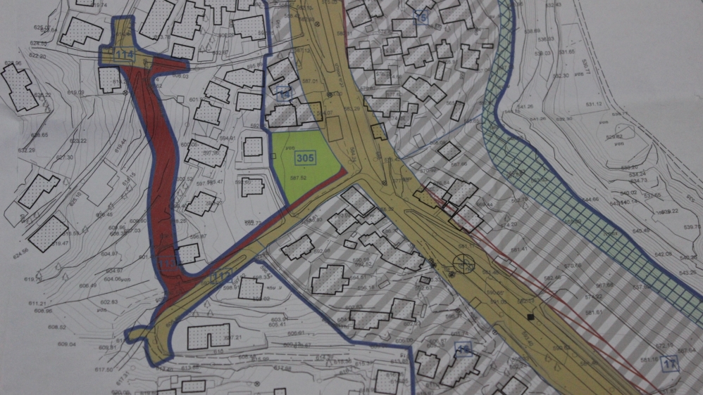 A map of the “American road” that will cut through Jabal al-Mukaber in Israeli-occupied East Jerusalem. Homes touching the shaded yellow area are under threat of being demolished