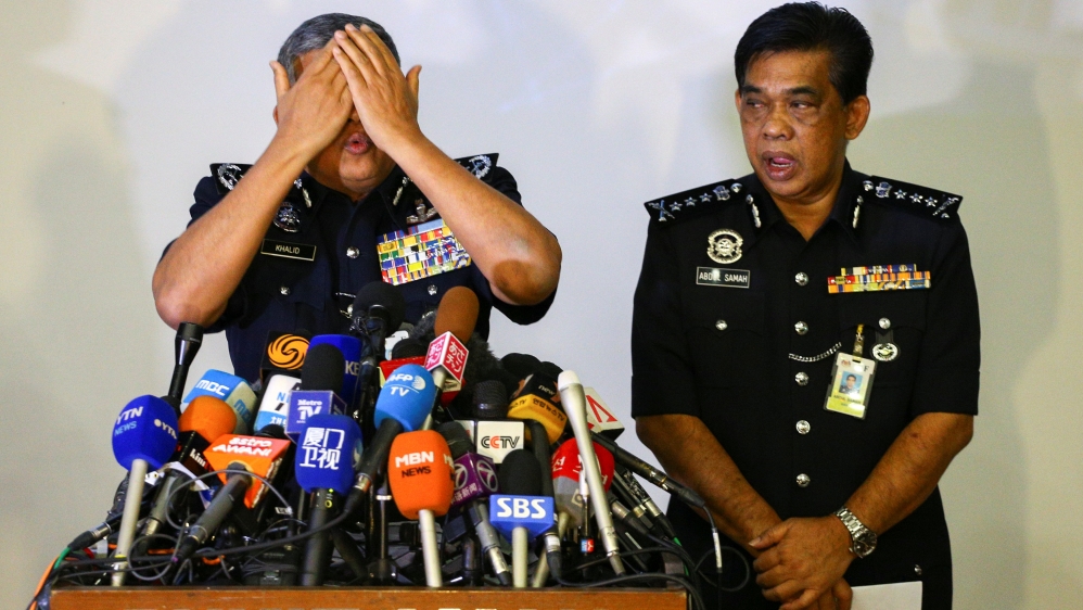 Khalid demonstrates during a news conference in Kuala Lumpur