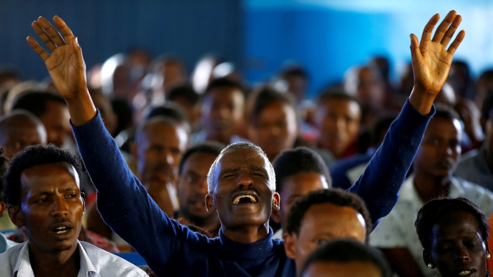 A man attends a prayer session at Biftu Bole Lutheran Church during a prayer and candle ceremony for the deaths of protesters, Addis Ababa, Ethiopia