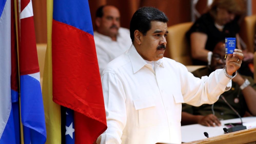 Maduro is fighting off opposition efforts to topple him as president [Reuters]