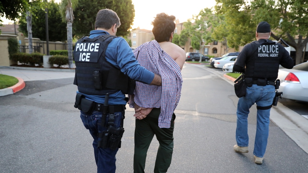 The Wider Image: ICE arrests immigrant