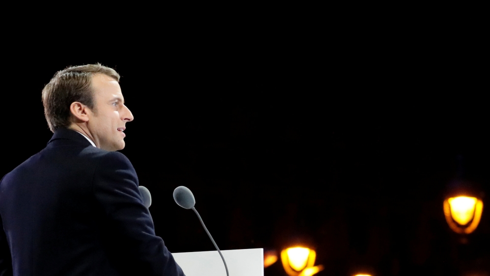 French President elect Emmanuel Macron delivers a speech during his victory rally near the Louvre museum after results in the 2017 presidential election in Paris
