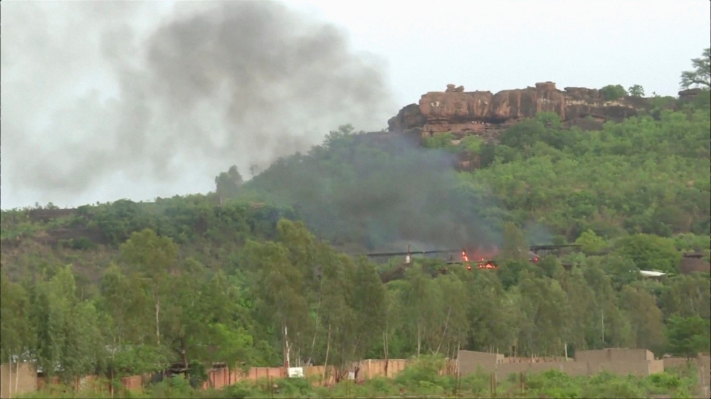 Flames rise following the attack on the popular resort [Reuters]