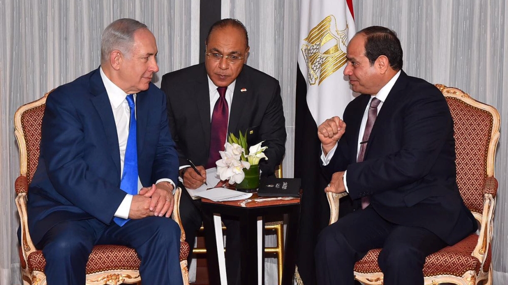 Egyptian President Abdel Fattah al-Sisi speaks with Israeli Prime Minister Benjamin Netanyahu