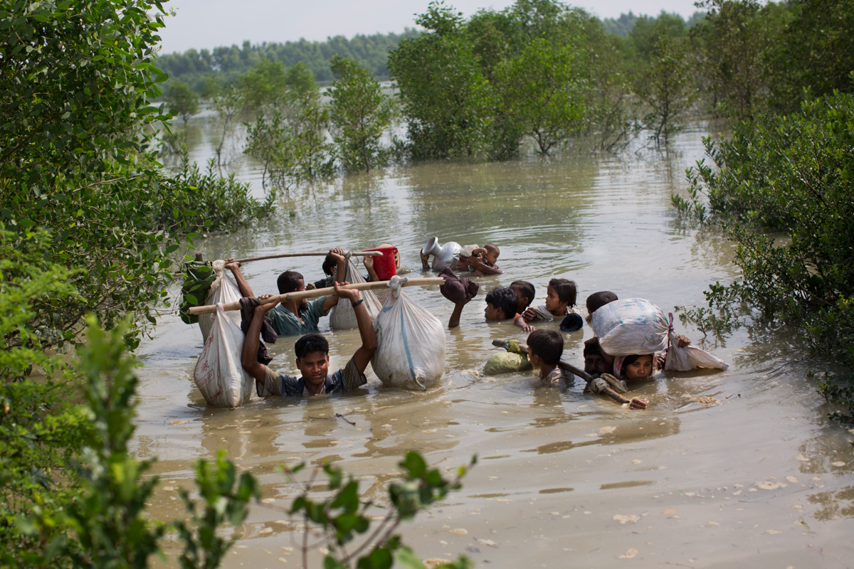 Rohingya Muslims fleeing violence.