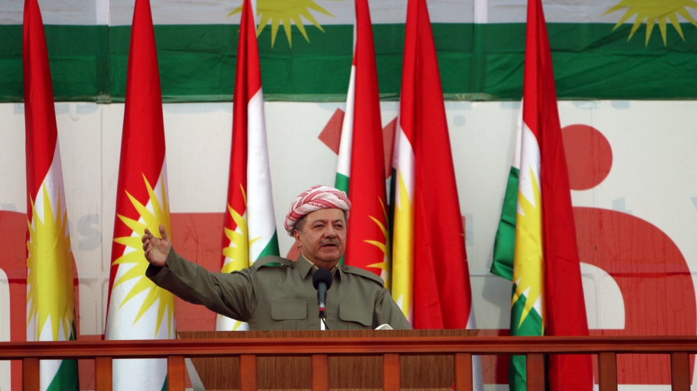 Iraqi Kurdish president Barzani salutes the crowd while attending a rally that shows the support for the upcoming September 25th independence referendum in Erbil