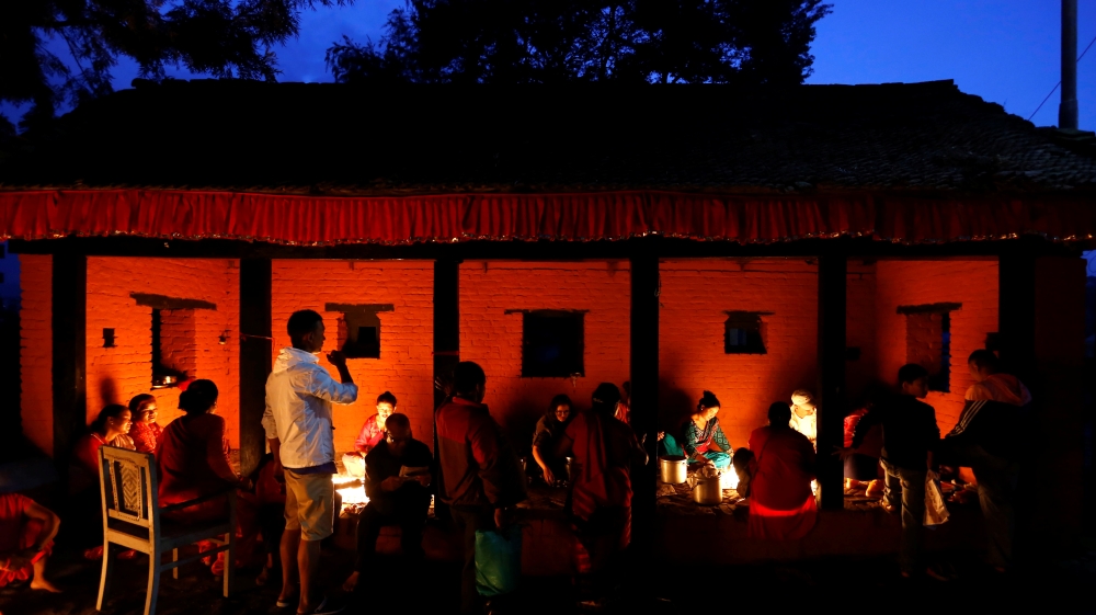 Devotees light oil lamps during "Dashain", a Hindu religious festival in Bhaktapur