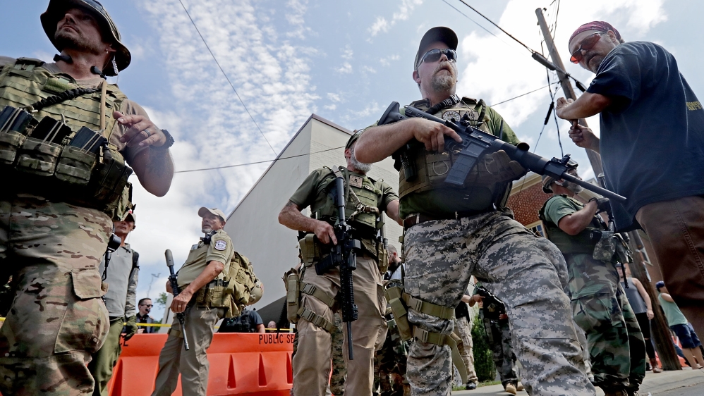 Militia groups have been active in far-right protests in recent years [Chip Somodevilla/Reuters]