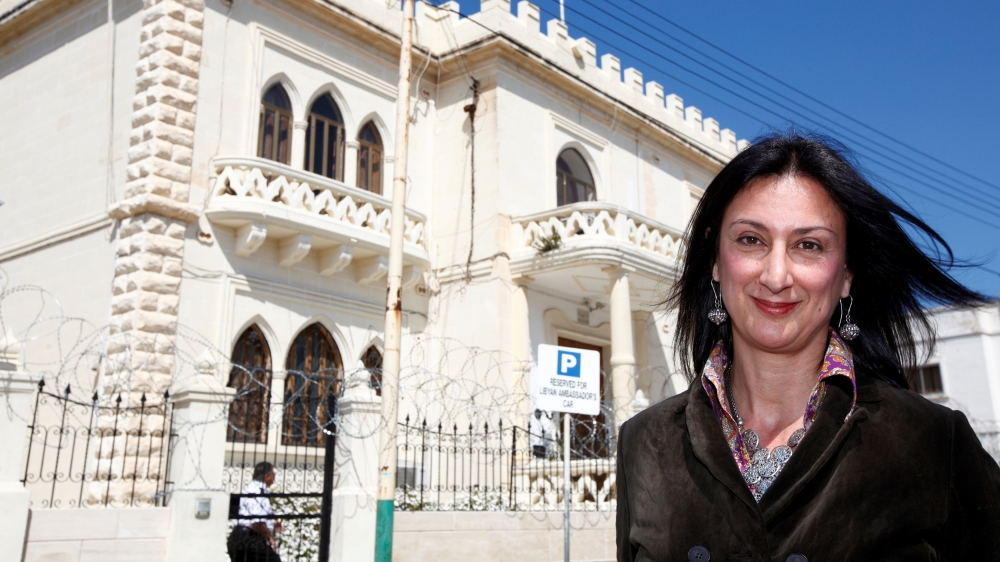 Maltese investigative journalist Daphne Caruana Galizia poses outside the Libyan Embassy in Valletta