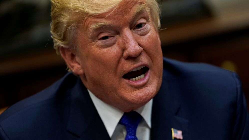 Trump speaks with reporters after meeting with McConnell and Ryan at the White House in Washington