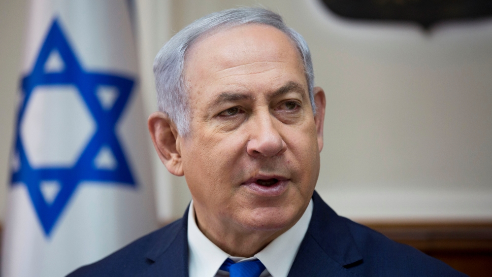 Israeli Prime Minister Benjamin Netanyahu chairs the weekly cabinet meeting at his office in Jerusalem