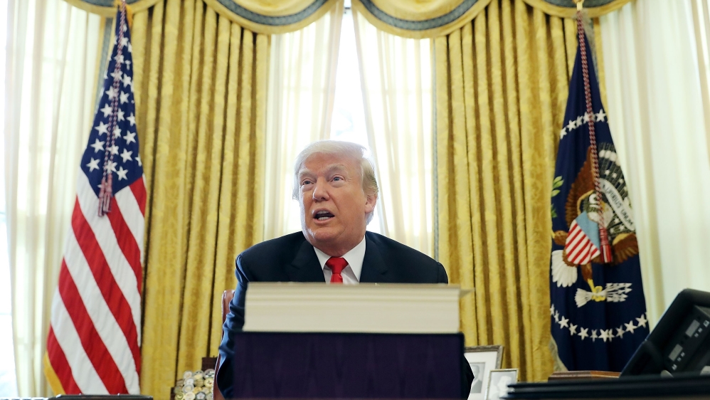 Donald Trump Signs Tax Reform And Jobs Bill Into Law At The White House