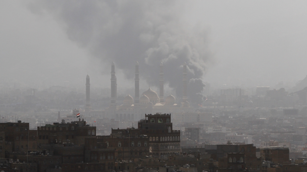 Smoke rises during the battle between former Yemeni President Ali Abdullah Saleh''s supporters and the Houthi fighters in Sanaa