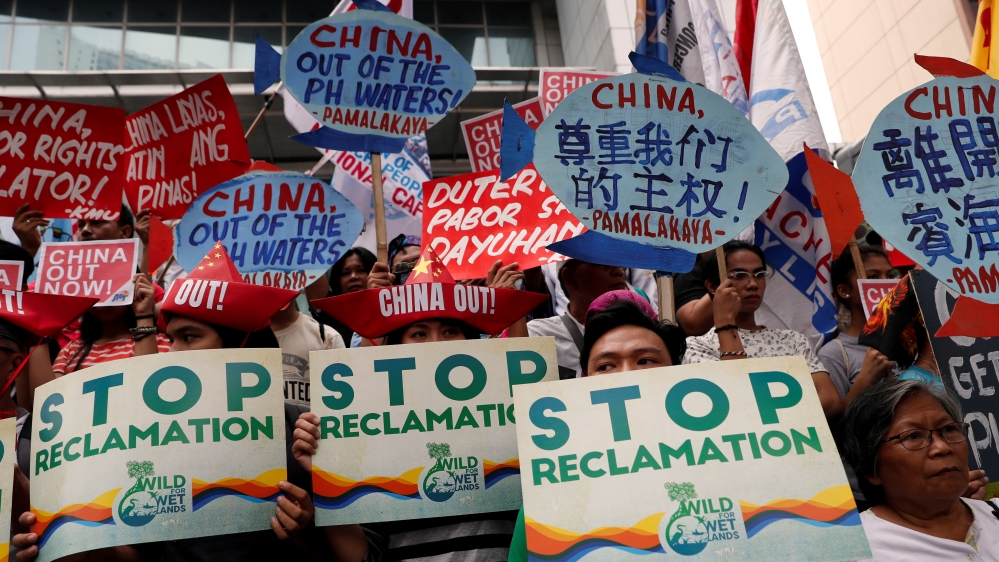 Filipino leftwing activists protest outside the Chinese Consulate in Manila