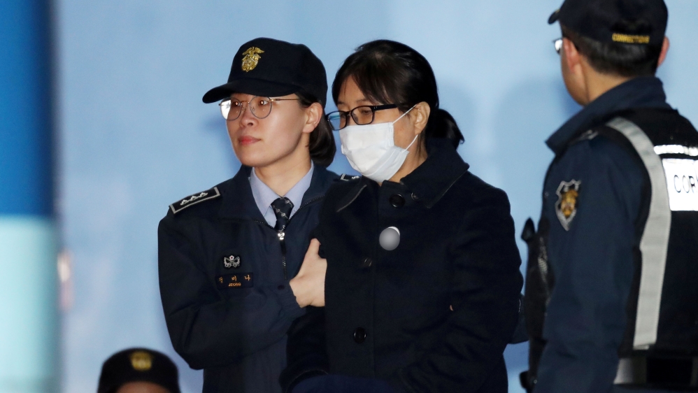 Choi Soon-sil, a confidante of former South Korean president Park Geun-hye, heads to take a bus to a detention center in Seoul